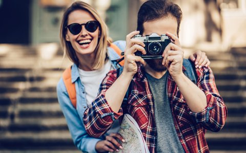 Boy and smiling girl with straight teeth from braces in Lafayette, CO