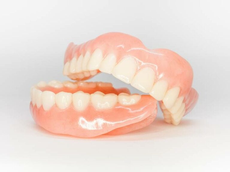Traditional dentures, upper and lower.