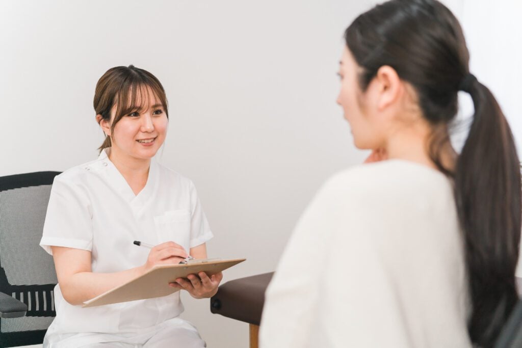 A patient speaking with a doctor.