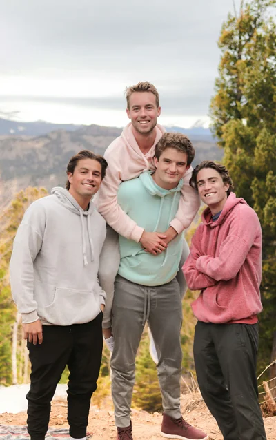 Erie Colorado family dentistry patients smile and post for a photo on a hike outdoors